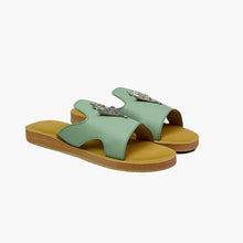 Load image into Gallery viewer, Main angle view of handmade mint green leather slide sandals with Berber silver adornments