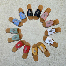 Load image into Gallery viewer, Multi-color collection of handmade Moroccan leather slide sandals with Berber silver adornments