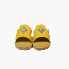 Load image into Gallery viewer, Front view of handmade mustard yellow leather slide sandals with Berber silver adornments