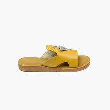 Load image into Gallery viewer, Side view of handmade mustard yellow leather slide sandals with Berber silver adornments